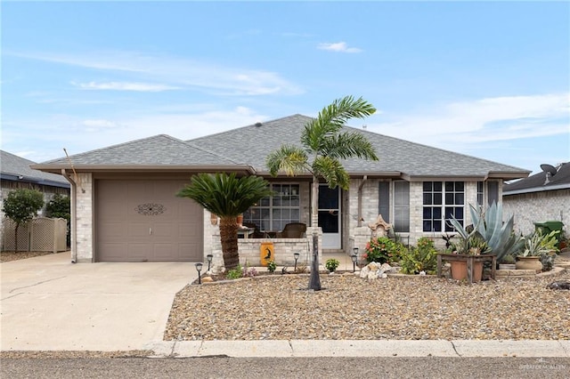 ranch-style house featuring a garage