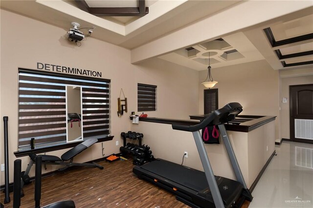 workout room with hardwood / wood-style floors