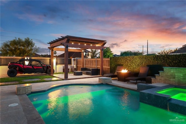 pool at dusk featuring a pergola, an in ground hot tub, an outdoor living space with a fire pit, and a patio