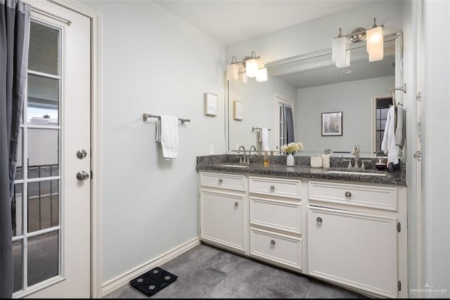 bathroom featuring vanity and tile patterned flooring