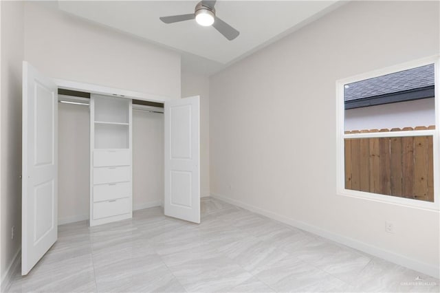 unfurnished bedroom featuring a closet and ceiling fan