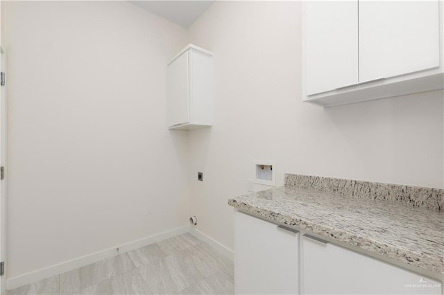 laundry room featuring cabinets, washer hookup, and hookup for an electric dryer