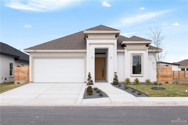 prairie-style home featuring a garage