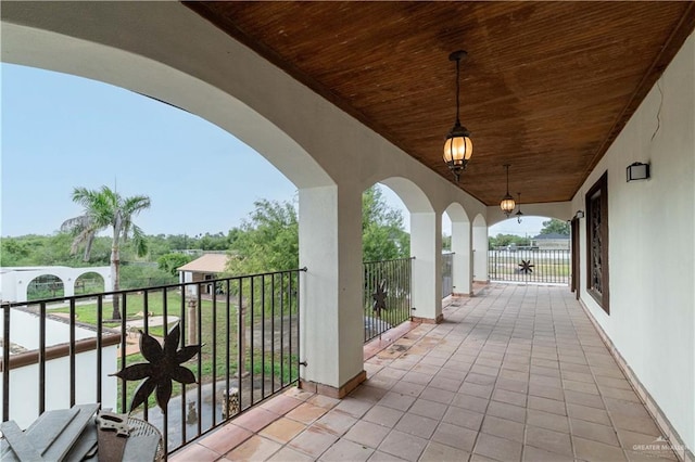 view of patio / terrace with a balcony