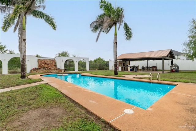 view of pool featuring a gazebo and a lawn