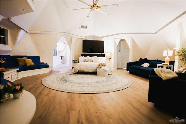 420 N Mayberry Rd, Alton, TX 78573 - living area featuring wood finished floors, ceiling fan, and high vaulted ceiling