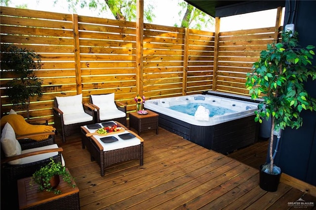 420 N Mayberry Rd, Alton, TX 78573 - wooden deck featuring a hot tub and an outdoor hangout area