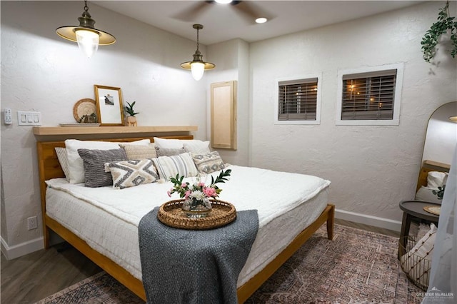 420 N Mayberry Rd, Alton, TX 78573 - bedroom with wood finished floors and baseboards