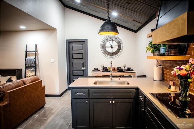420 N Mayberry Rd, Alton, TX 78573 - kitchen with black electric cooktop, light countertops, recessed lighting, a peninsula, and vaulted ceiling
