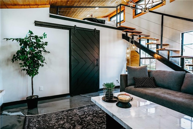 420 N Mayberry Rd, Alton, TX 78573 - living room featuring wood ceiling, stairs, a barn door, and vaulted ceiling