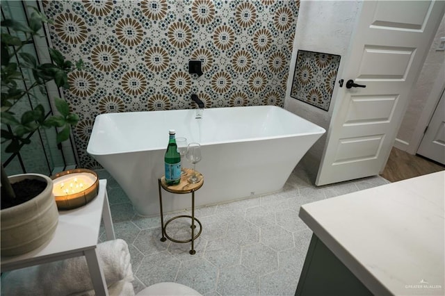 420 N Mayberry Rd, Alton, TX 78573 - bathroom featuring a soaking tub, vanity, and tile patterned floors