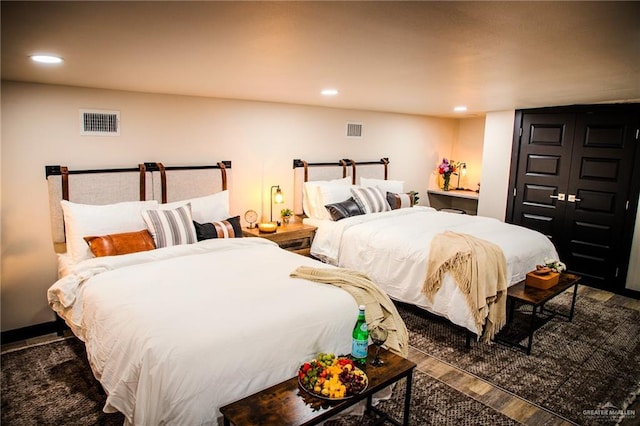 420 N Mayberry Rd, Alton, TX 78573 - bedroom with wood finished floors and recessed lighting