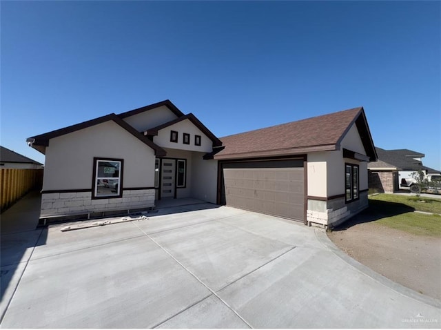 view of front of property featuring a garage