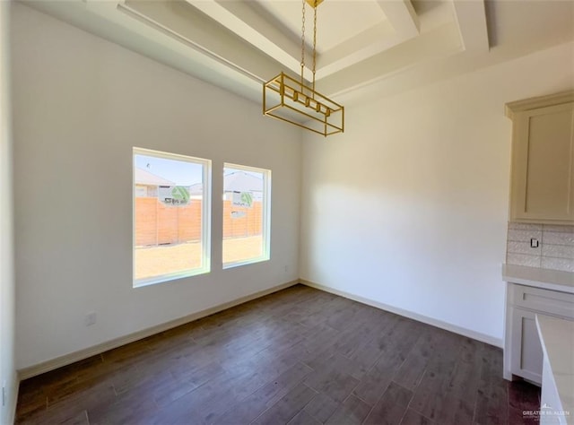 unfurnished dining area featuring dark hardwood / wood-style flooring