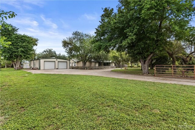 view of yard featuring a garage