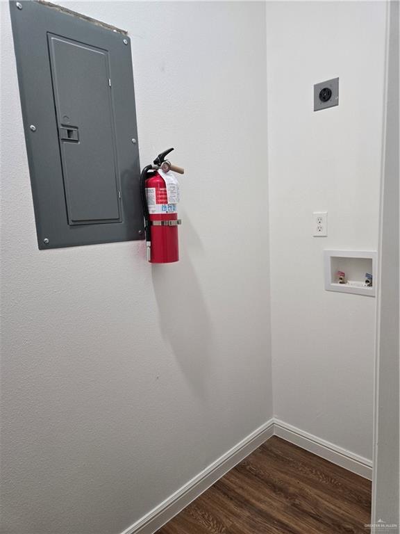 901 E Yuma Ave Unit 206, Mcallen, TX 78503 - laundry area with electric panel, hookup for a washing machine, laundry area, electric dryer hookup, and dark wood-style floors