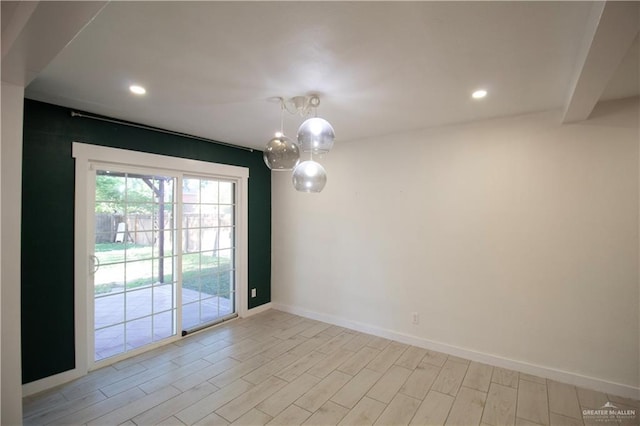 unfurnished room featuring baseboards, recessed lighting, and light wood-style flooring