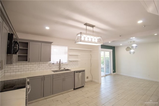 kitchen featuring open shelves, stainless steel dishwasher, gray cabinets, a sink, and black microwave