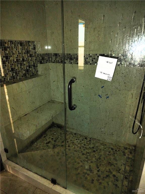 bathroom featuring walk in shower