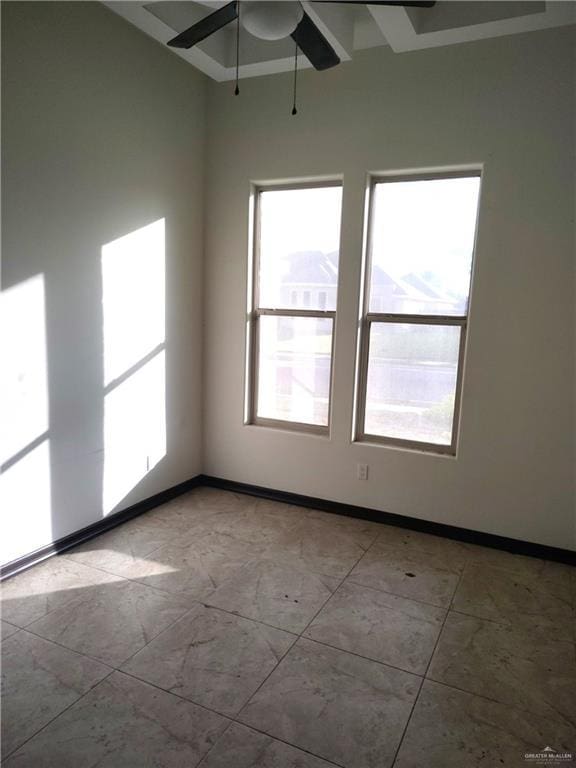 spare room featuring ceiling fan