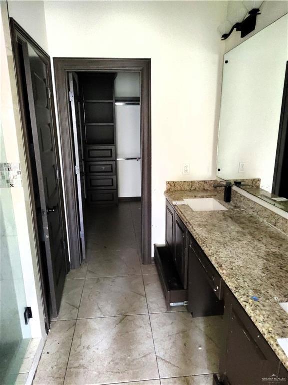 bathroom featuring vanity and tile patterned floors