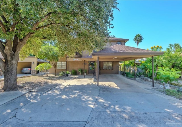 view of front of home featuring a carport