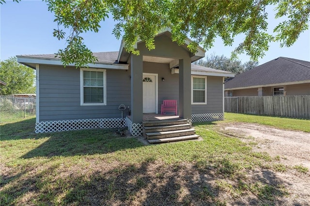 view of front facade with a front yard