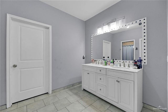 bathroom featuring vanity and tile patterned floors