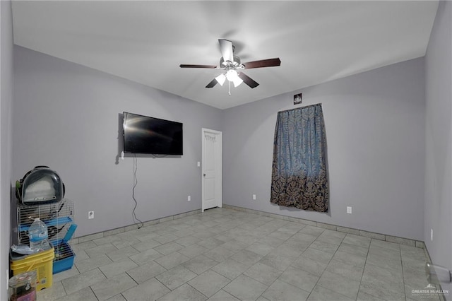 spare room featuring ceiling fan