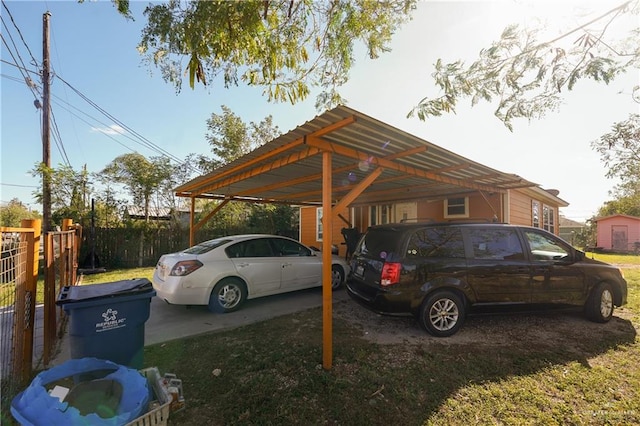 view of vehicle parking featuring a carport