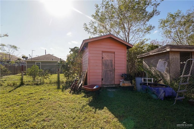 view of outdoor structure featuring a yard