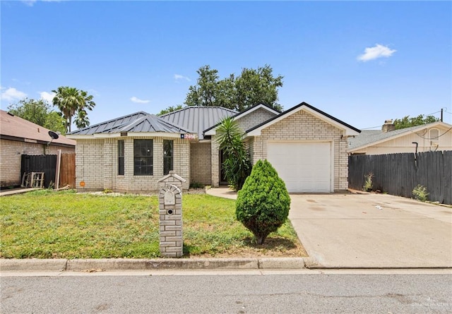 4217 W Ithaca Ave, Mcallen, TX 78501 - ranch-style home with a garage, driveway, brick siding, and metal roof