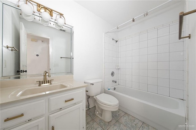 4217 W Ithaca Ave, Mcallen, TX 78501 - full bathroom with toilet, vanity, shower / washtub combination, and tile patterned floors