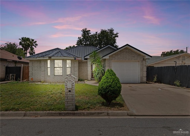 4217 W Ithaca Ave, Mcallen, TX 78501 - ranch-style home featuring a garage and concrete driveway