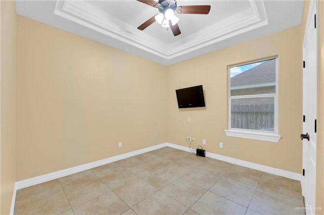 3218 Lerma Dr, Edinburg, TX 78539 - spare room featuring a raised ceiling, light tile patterned flooring, ceiling fan, and crown molding