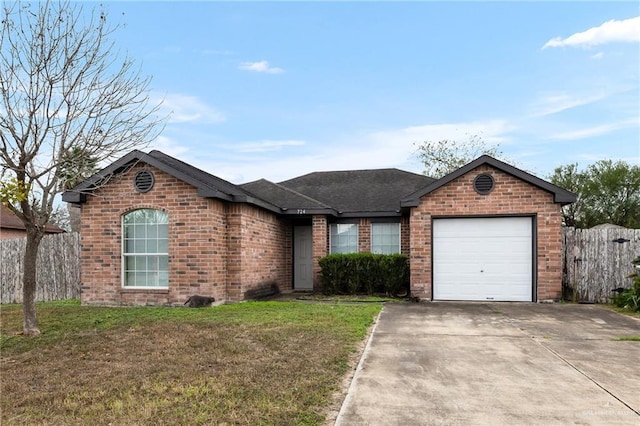 single story home featuring a front lawn and a garage