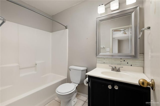 full bathroom with decorative backsplash, tile patterned floors, vanity, ceiling fan, and toilet