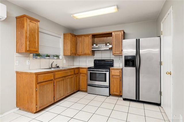 kitchen featuring stainless steel appliances, extractor fan, tasteful backsplash, and sink