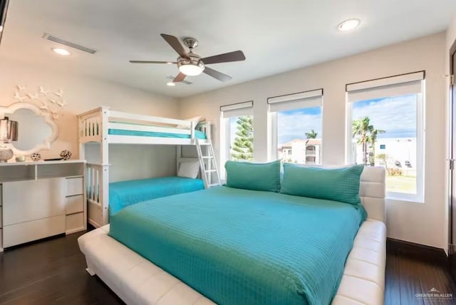 bedroom featuring recessed lighting, visible vents, ceiling fan, wood finished floors, and baseboards