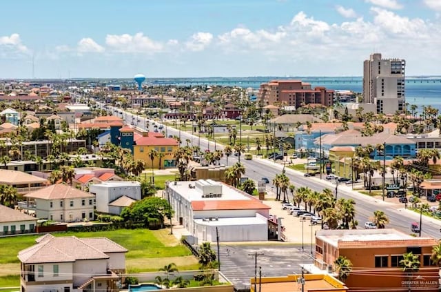 birds eye view of property with a view of city