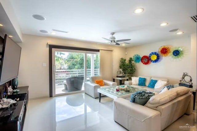 living area featuring ceiling fan, baseboards, visible vents, and recessed lighting