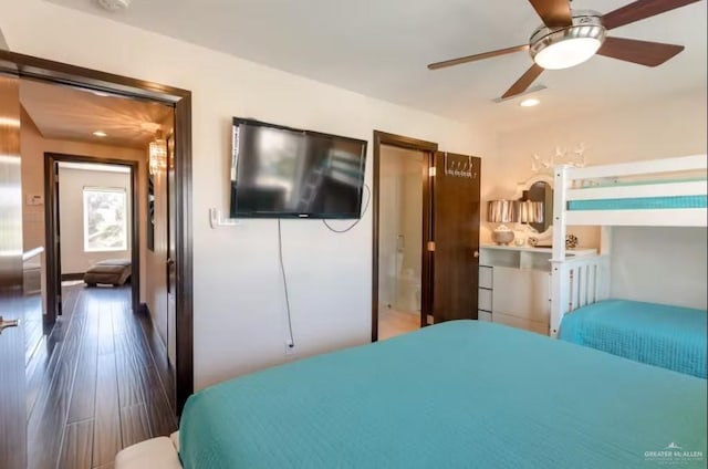 bedroom featuring a ceiling fan, wood finished floors, and recessed lighting