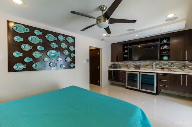 unfurnished bedroom with wine cooler, a sink, a bar, and recessed lighting