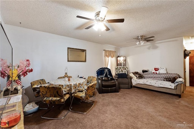living room featuring carpet flooring, a textured ceiling, and ceiling fan