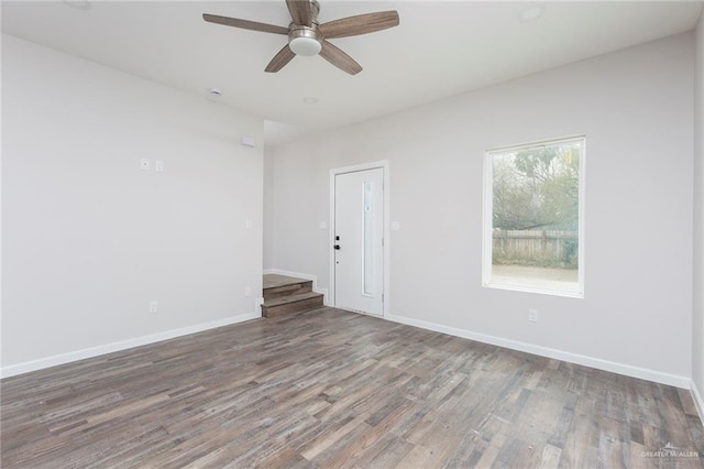 unfurnished room with wood-type flooring and ceiling fan