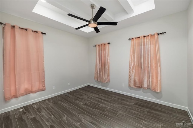 3312 Saturn St, Edinburg, TX 78542 - spare room with dark wood-type flooring, baseboards, and a ceiling fan