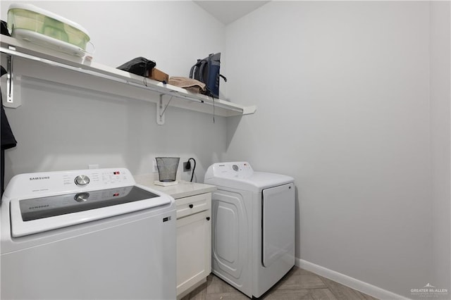 3702 Bea Ave, Harlingen, TX 78552 - laundry room with cabinet space, baseboards, and separate washer and dryer