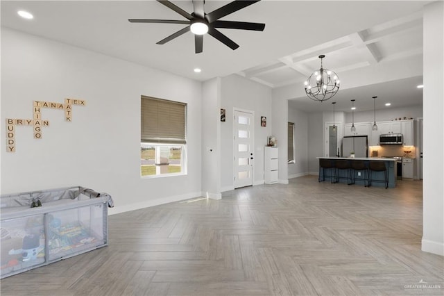 3702 Bea Ave, Harlingen, TX 78552 - living area with recessed lighting, beam ceiling, baseboards, and ceiling fan with notable chandelier