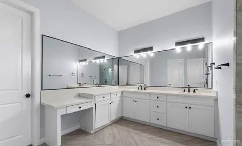 bathroom with double vanity and a sink