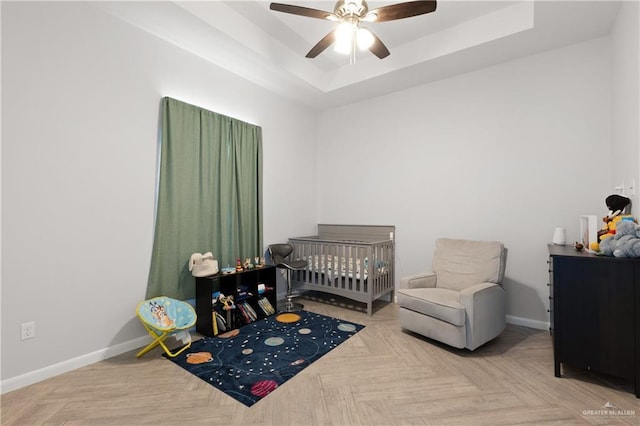 3702 Bea Ave, Harlingen, TX 78552 - bedroom with ceiling fan, baseboards, and a raised ceiling